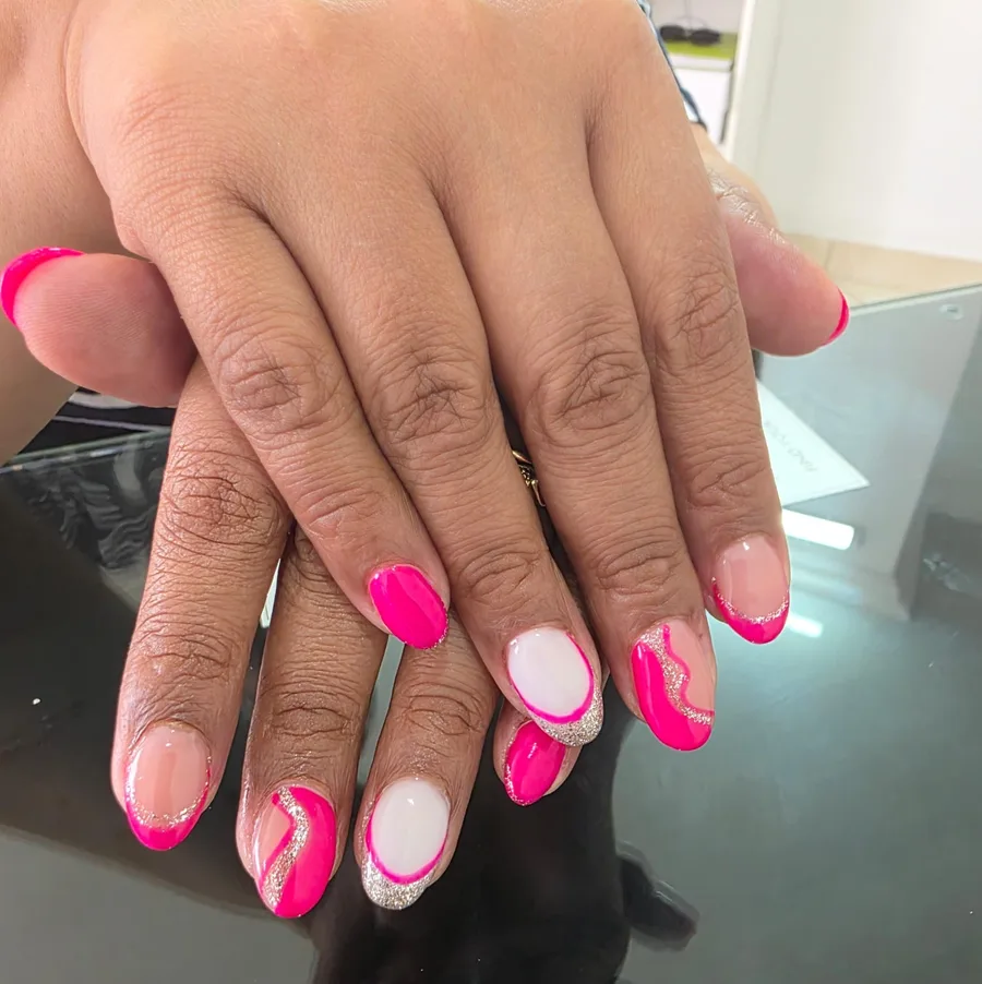 Hot pink nails with glitter tips