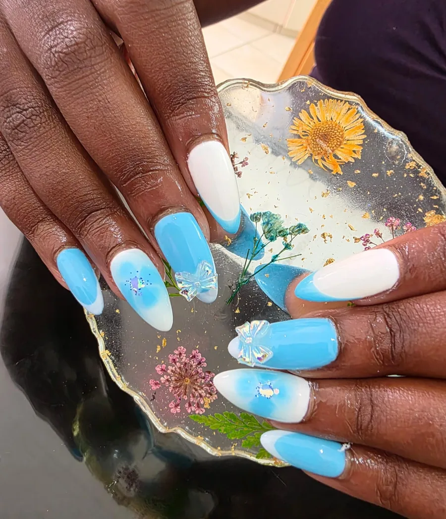 Sky blue ombre nails with butterflies