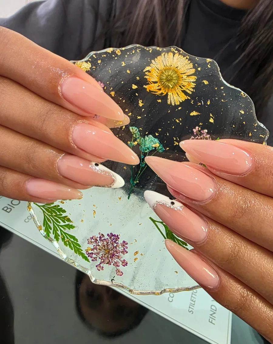 Almond nude nails with white tips