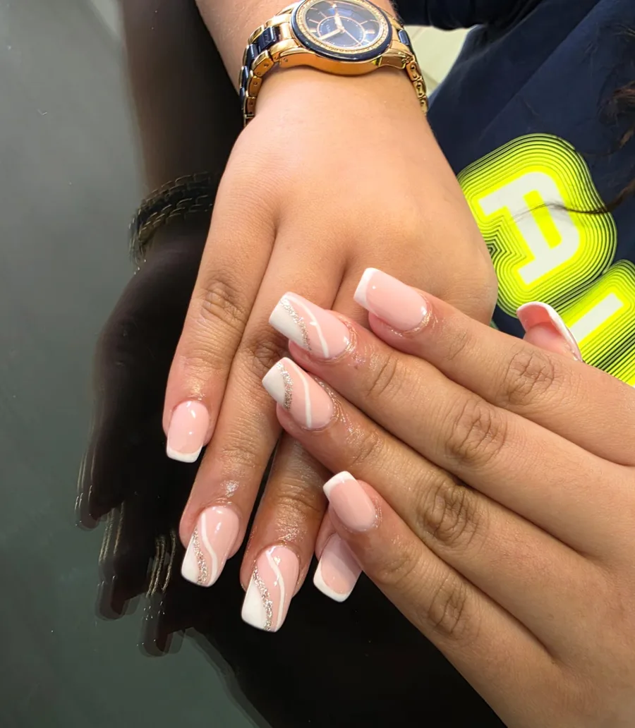 Nude French nails with glitter lines